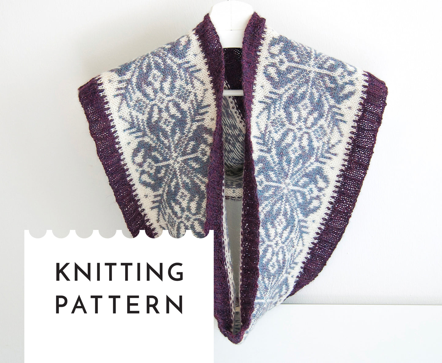 hand-knitted Fair Isle cowl in Snowflake pattern made from purple and white alpaca wool yarn