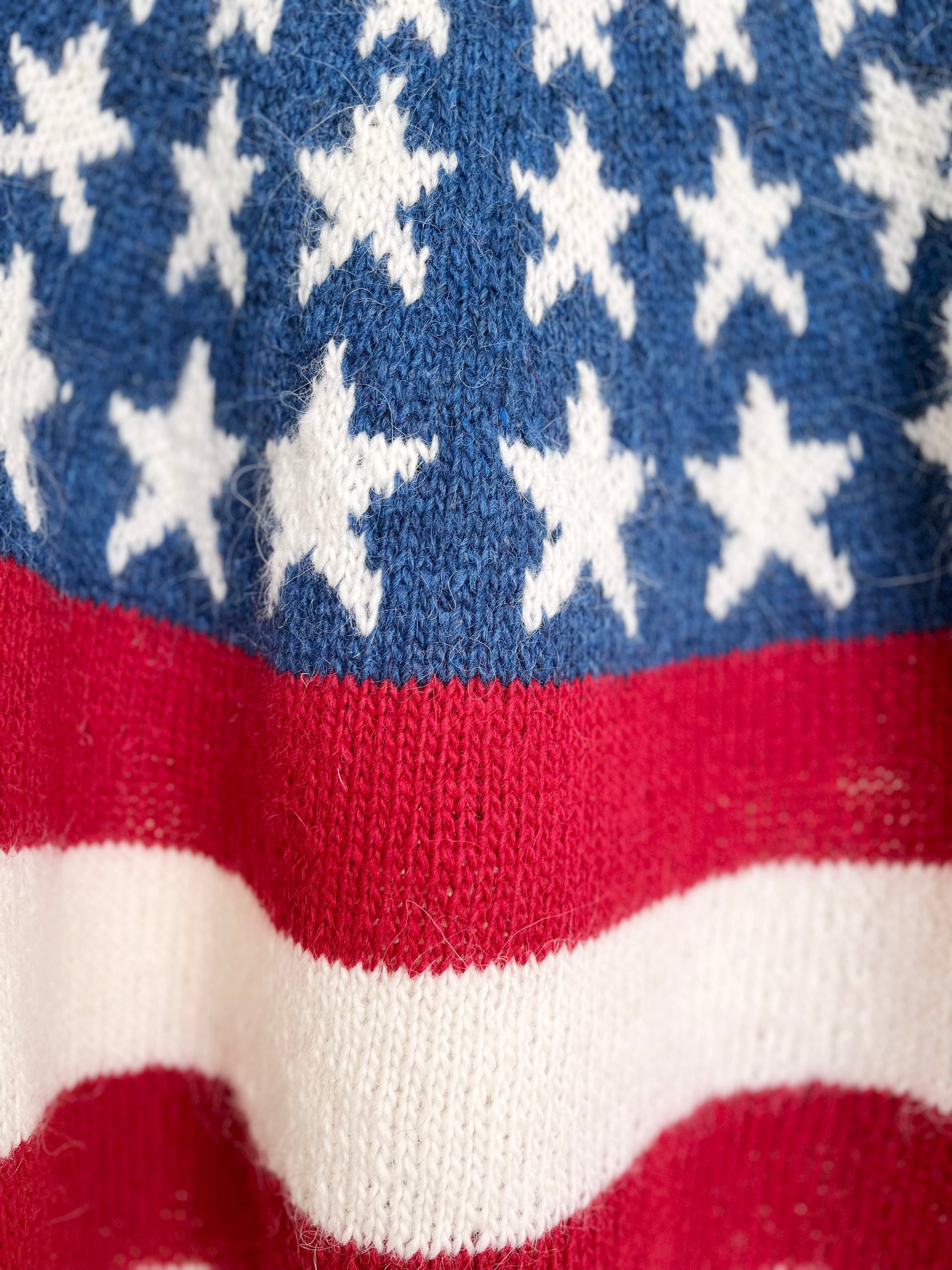 Details of Hand-knitted lopapeysa sweater in the USA FLAG design made with pure Icelandic wool