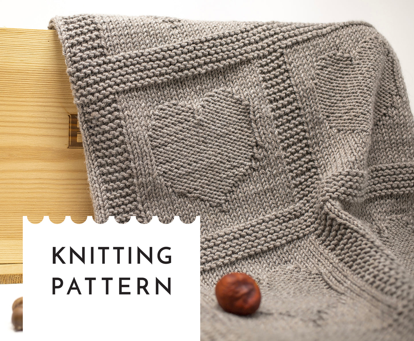 beige brown merino wool hand-knitted baby blanket in Hearts knitting pattern