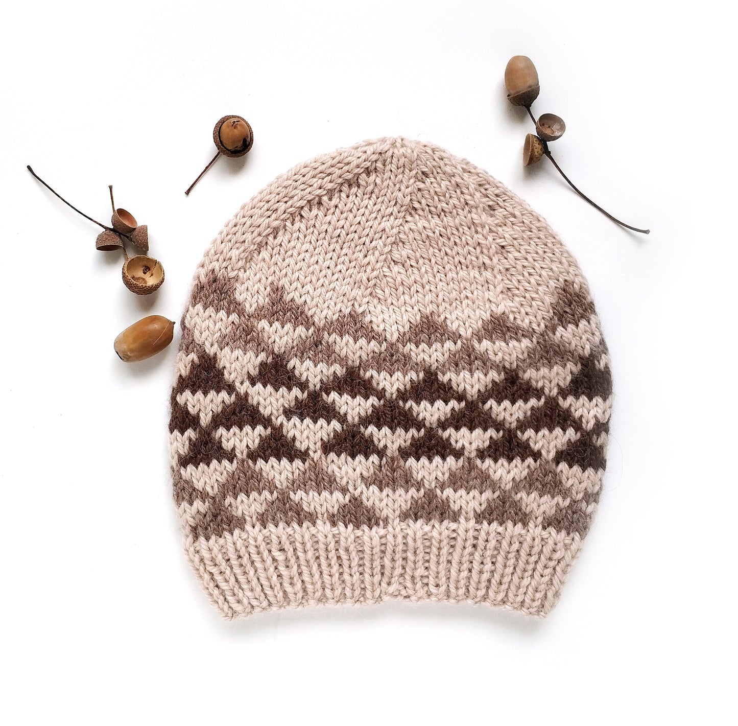 beige and brown wool hand-knitted Fair Isle beanie hat in triangles knitting pattern