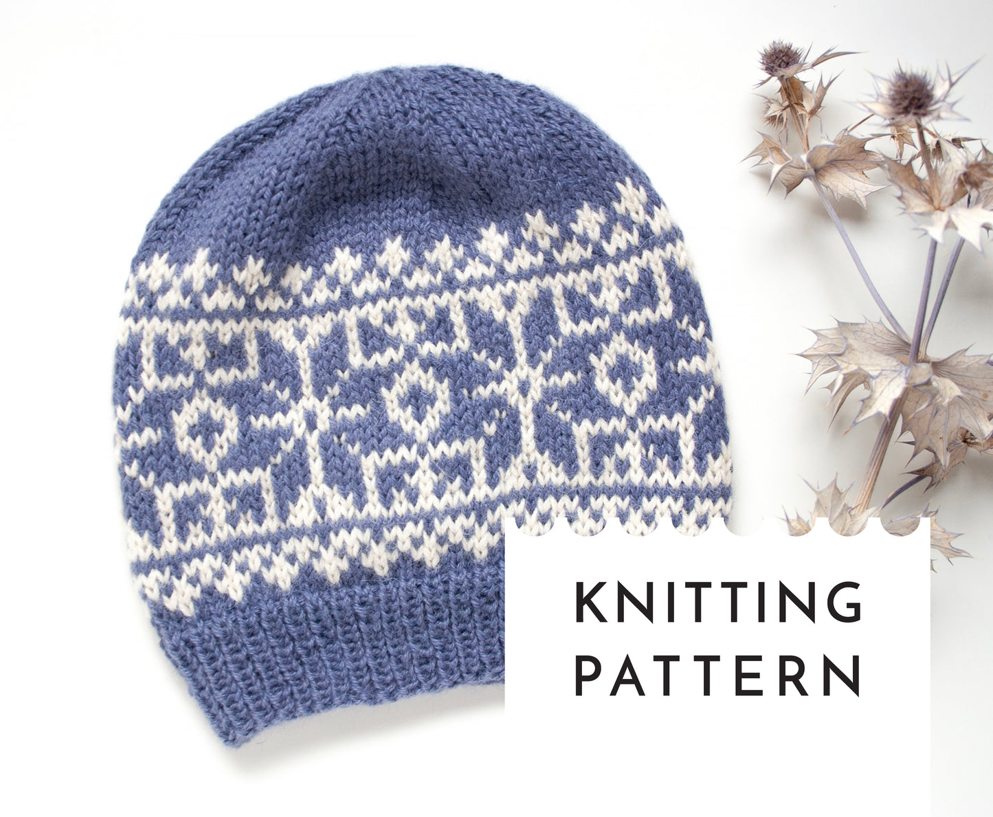 blue and white alpaca wool hand-knitted Fair Isle beanie hat in snowflake knitting pattern