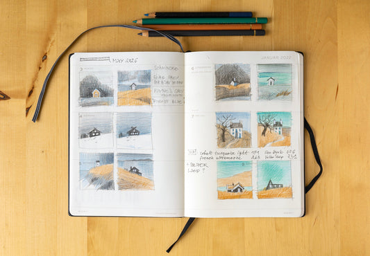 Open sketchbook with small landscapes drawn in colored pencil