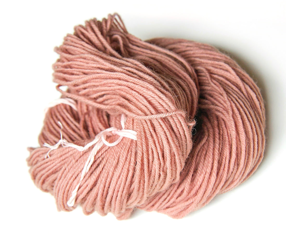 hand-dyed pink wool yarn