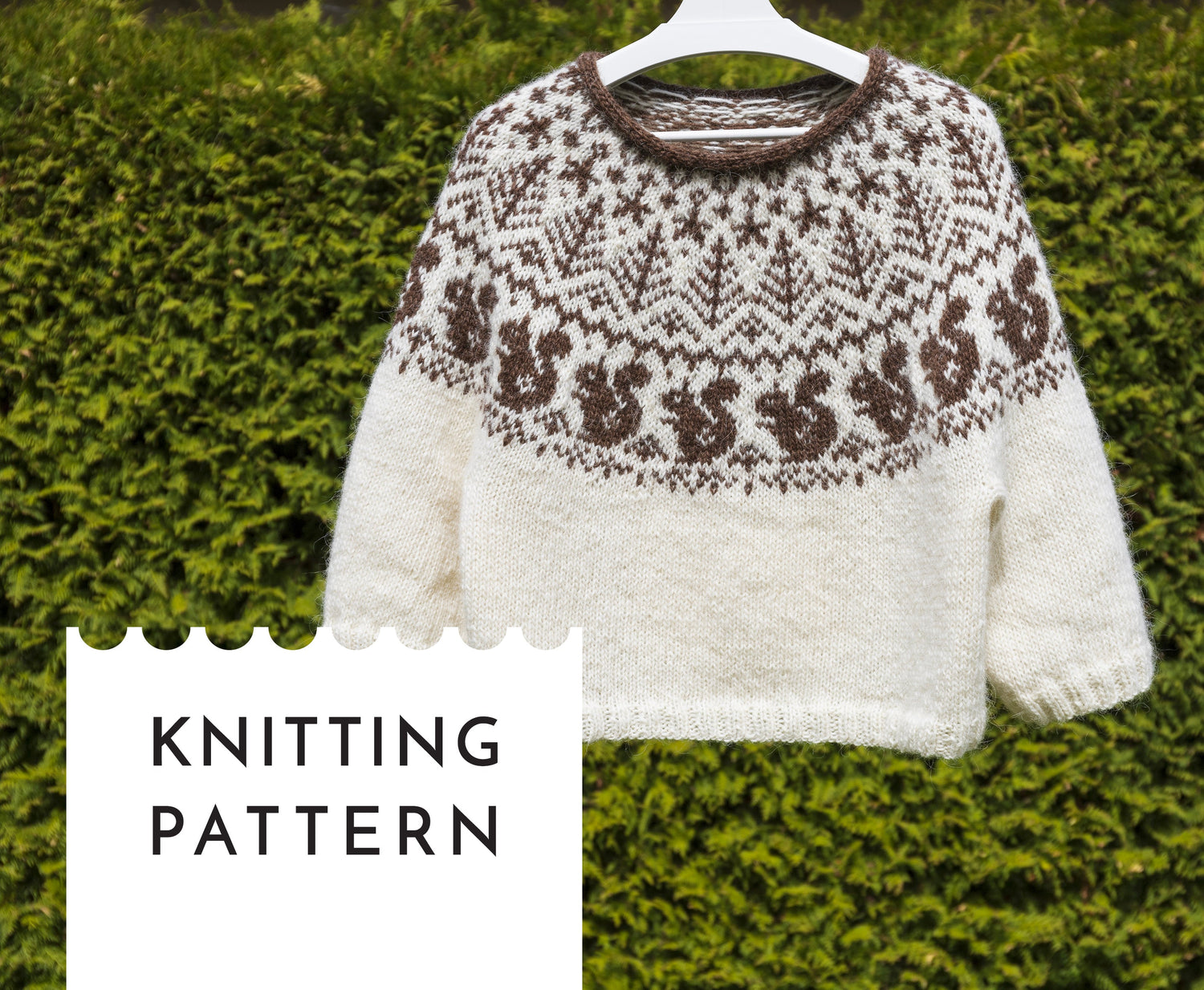 hand-knitted icelandic lopapeysa in white and brown with squirrel motif