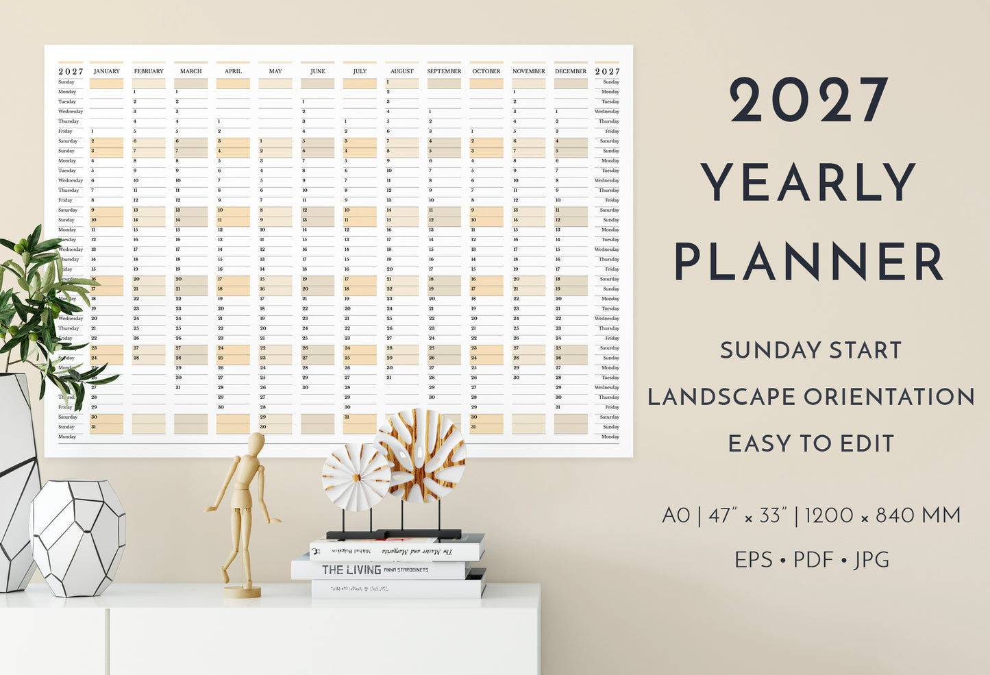2027 yearly planner on a wall with decorative items below