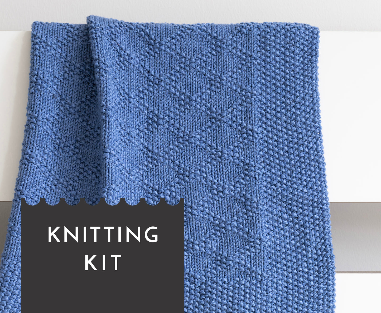 Merino wool hand-knitted baby blanket in Charles Brocade knitting pattern