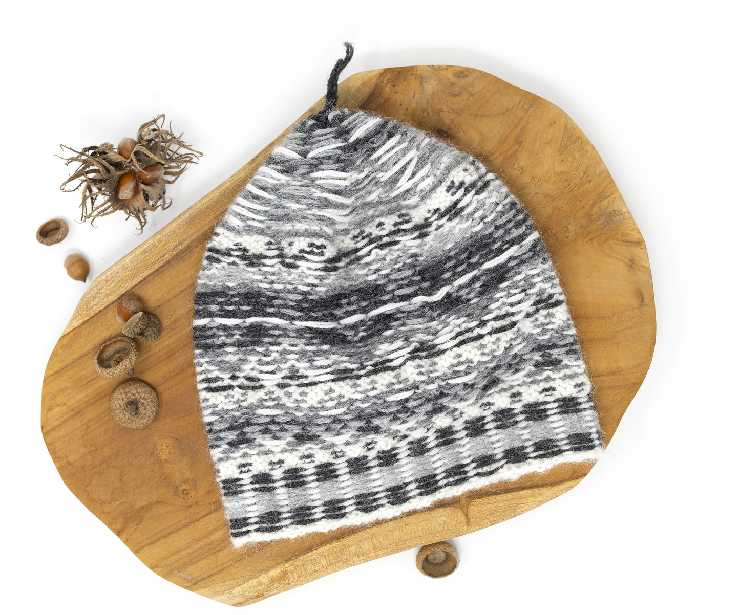 Grey, white and black alpaca wool hand-knitted Fair Isle hat inside out