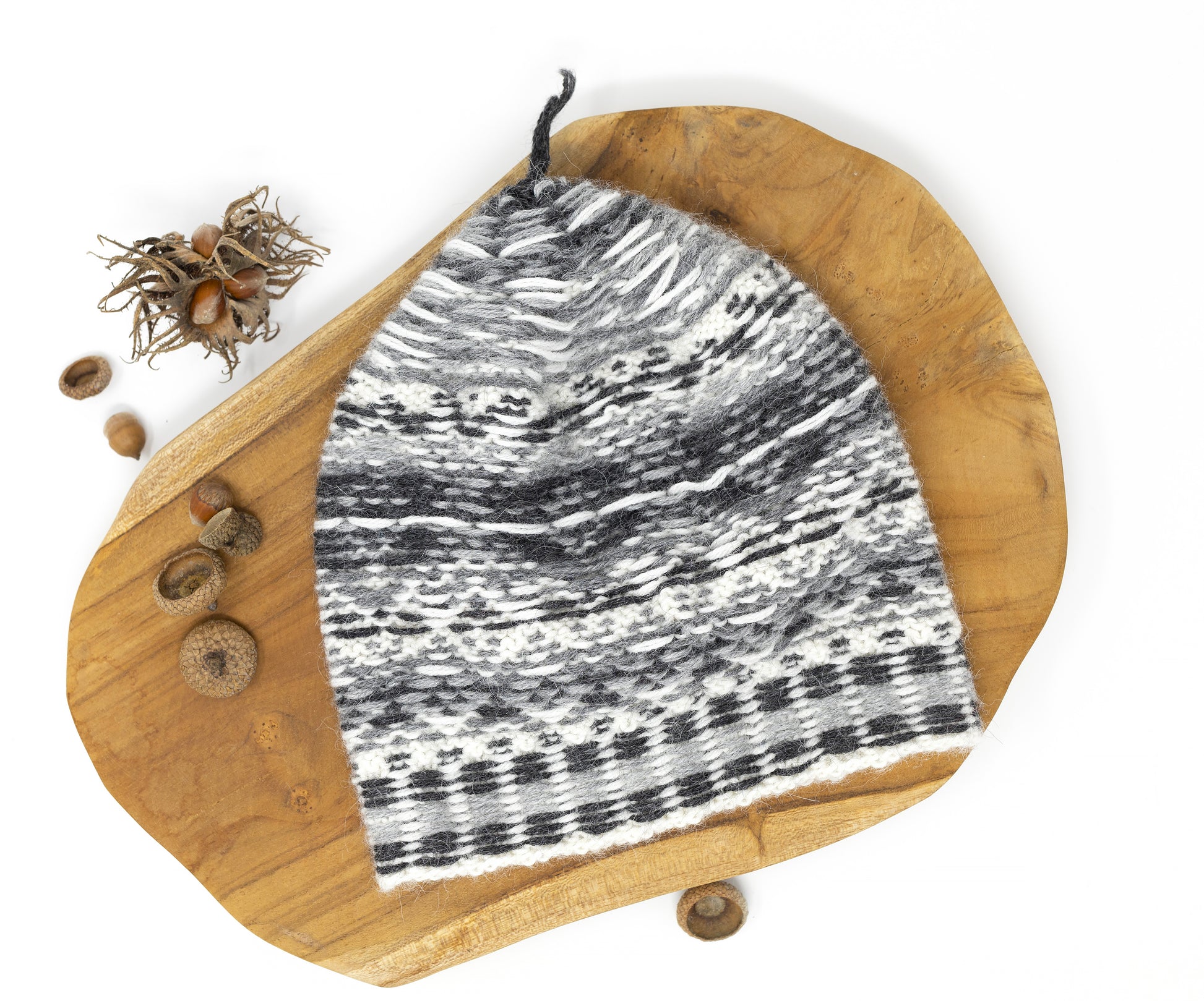 Grey, white and black alpaca wool hand-knitted Fair Isle hat inside out