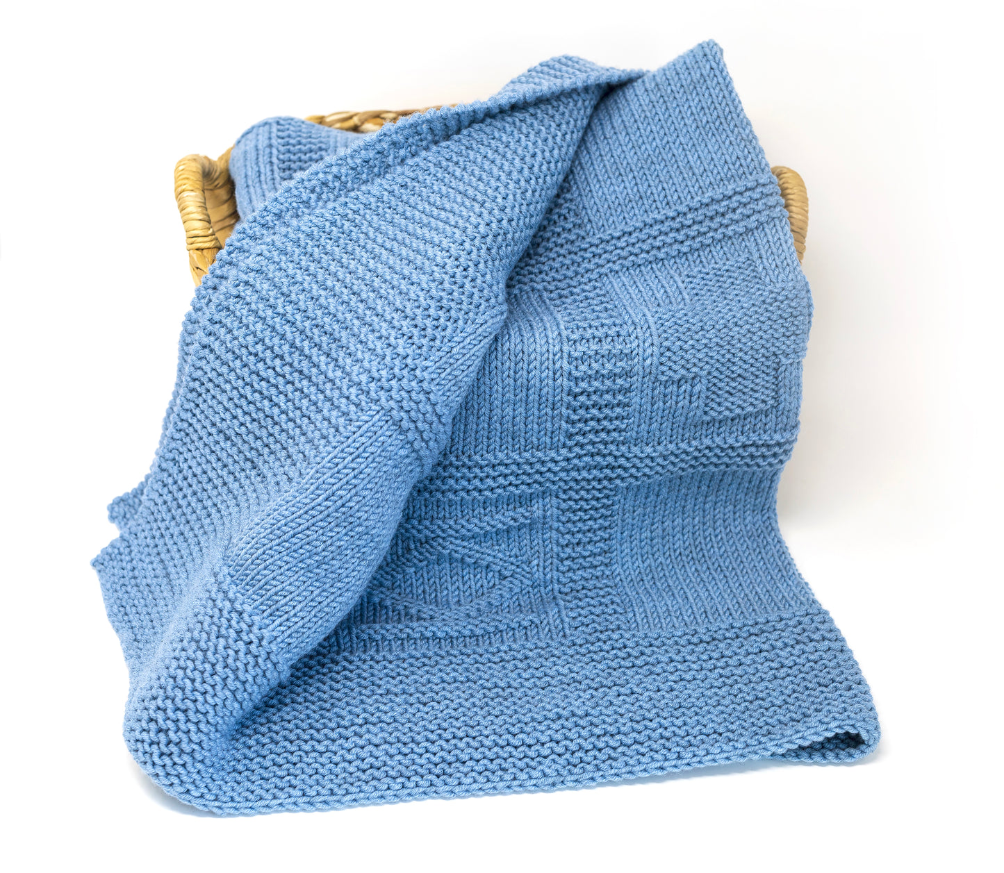 Leland blue merino wool hand-knitted baby blanket in geometric pattern