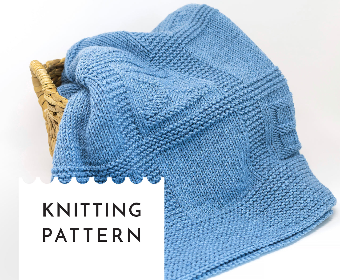 blue merino wool hand-knitted baby blanket in geometric knitting pattern