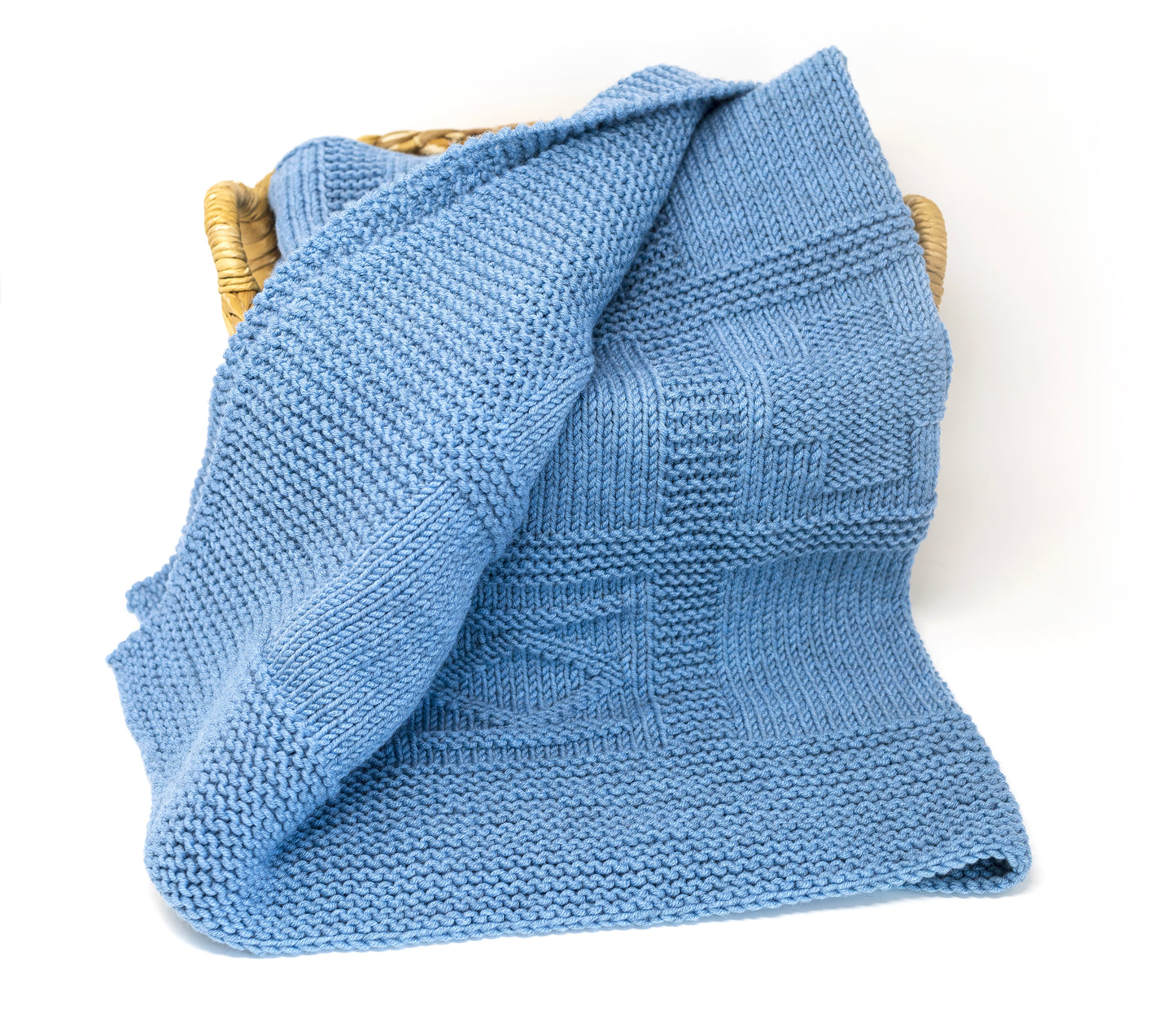 blue merino wool hand-knitted baby blanket in geometric knitting pattern