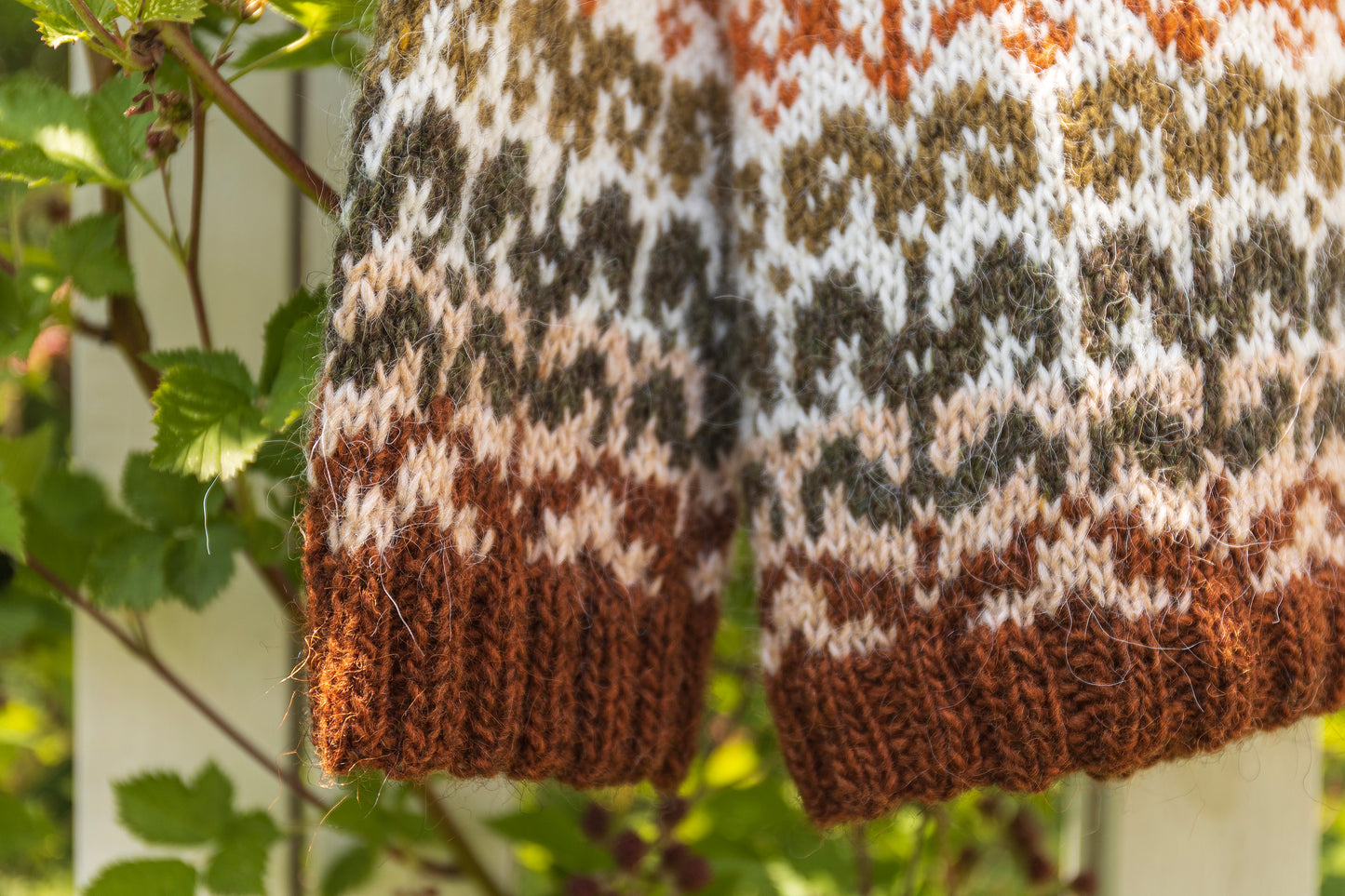 close-uo of hem and cuff of Meadow icelandic lopapeysa sweater with floral pattern