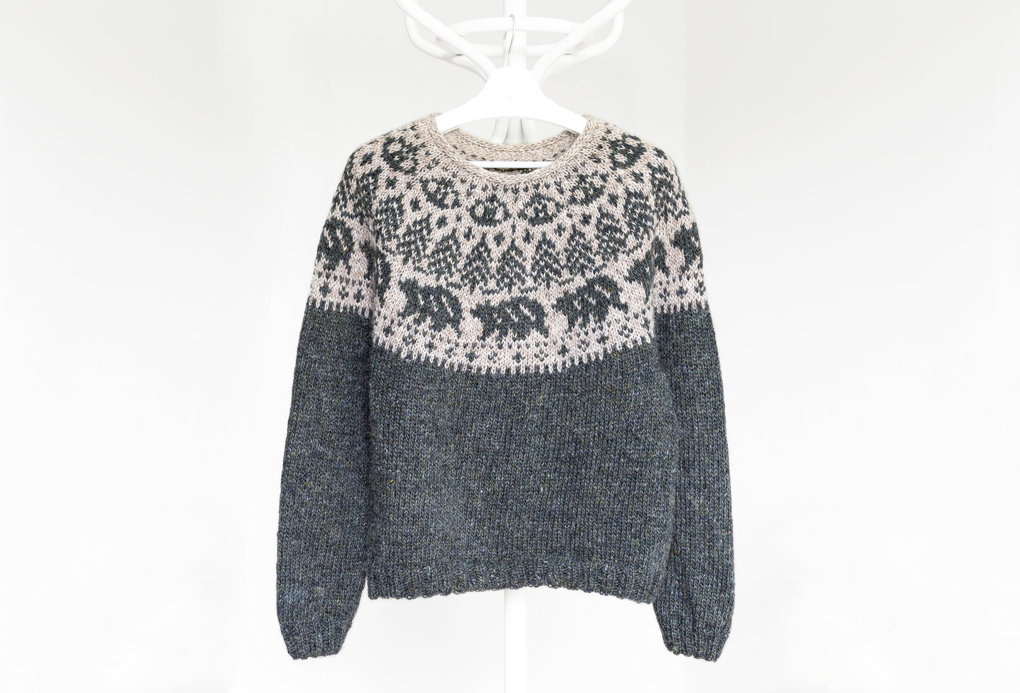 Mishka The Bear hand-knitted sweater with a patterned design on a white background