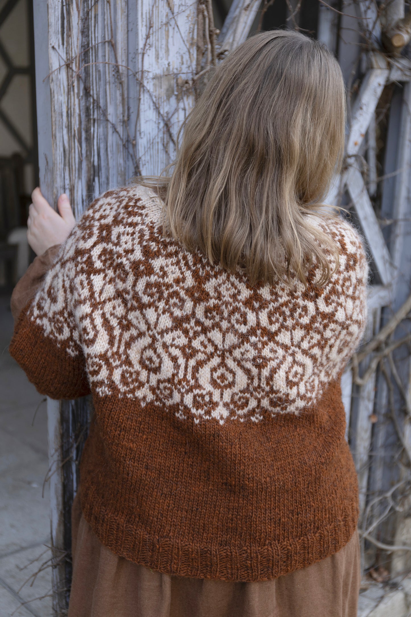 Back view of Mora icelandic lopapeysa sweater with floral yoke