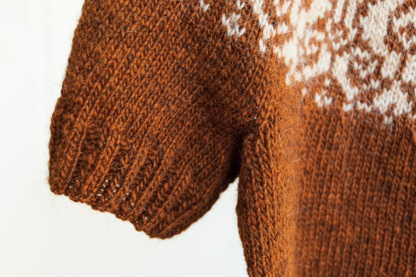 close-up of a cuff of Mora icelandic lopapeysa sweater with floral yoke
