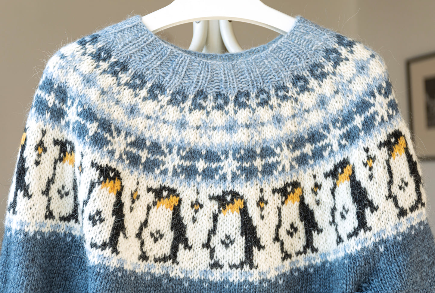 Details of yoke with penguins motif of icelandic lopapeysa sweater
