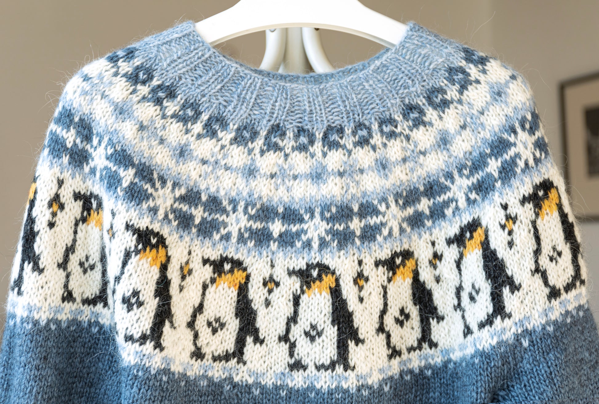 Details of yoke with penguins motif of icelandic lopapeysa sweater