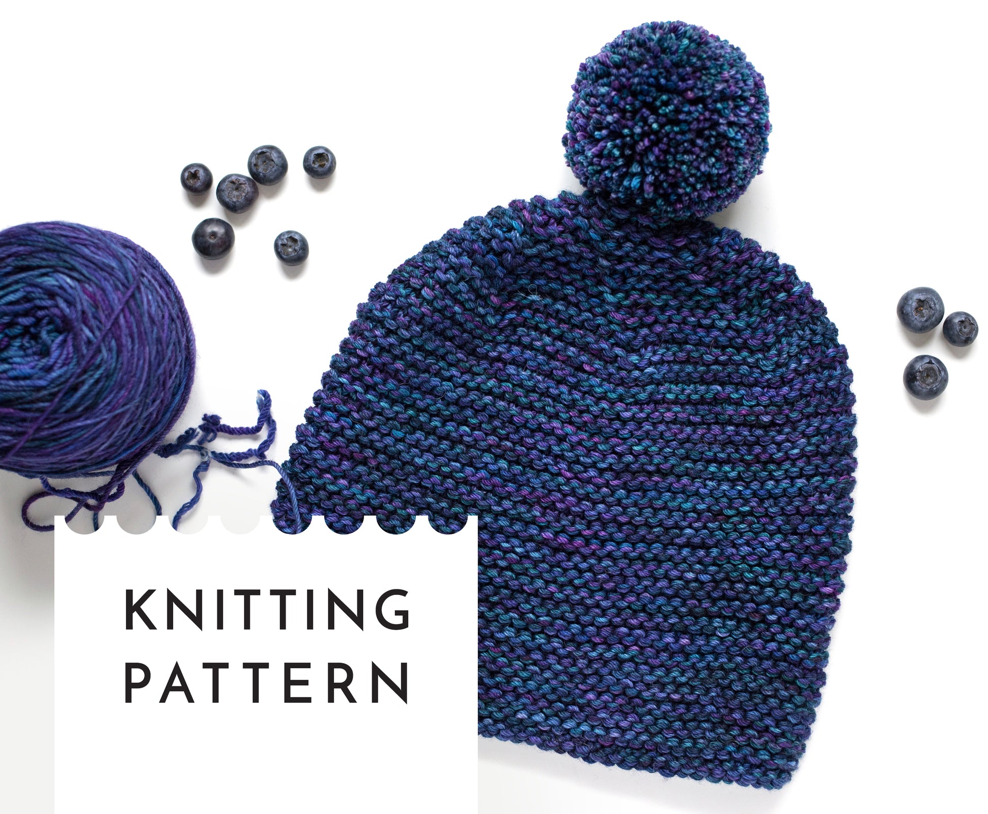 blue and purple gradient wool garter stitch hand-knitted pom pom hat