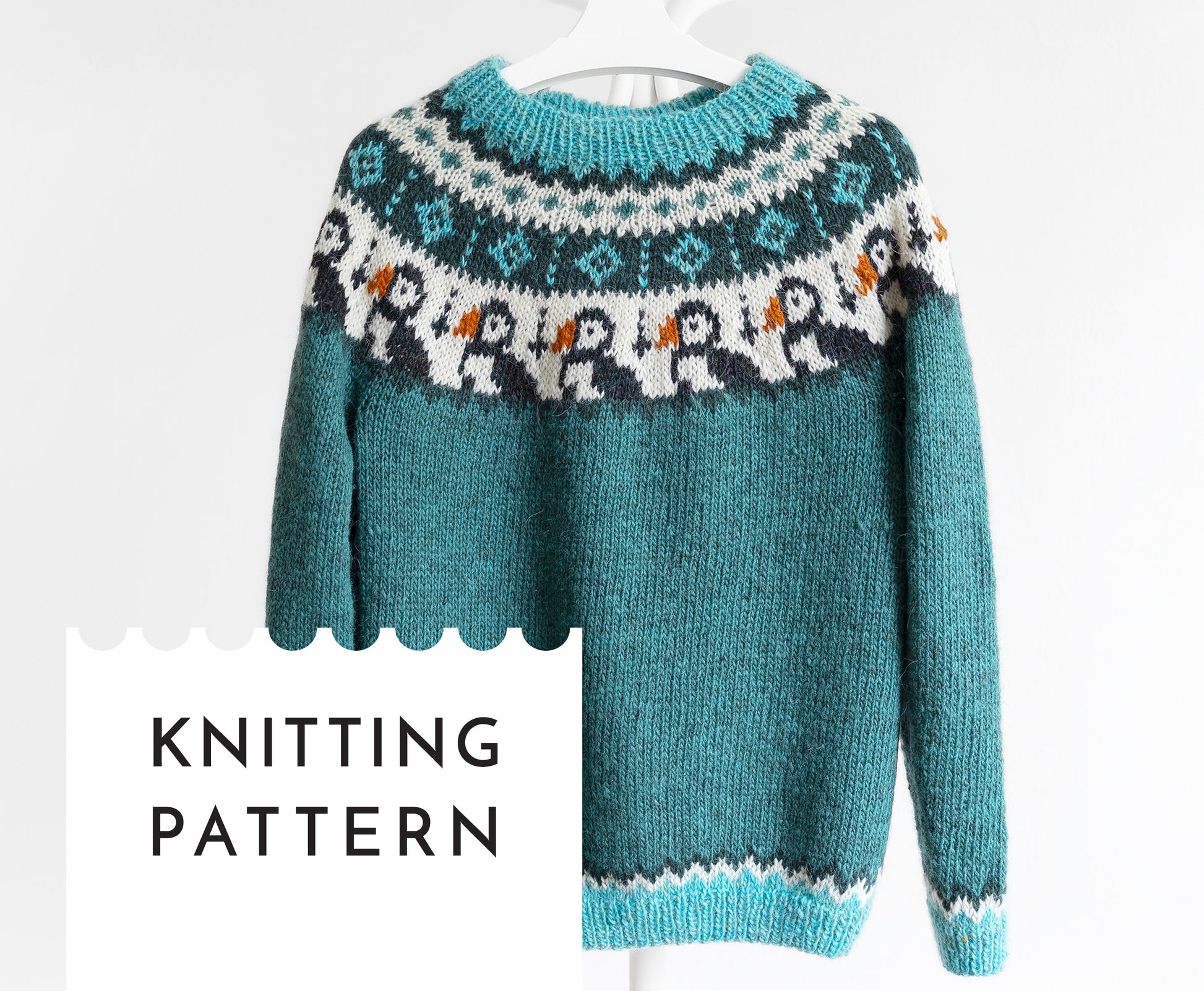 A knitted sweater with a geometric pattern featuring puffin motifs, predominantly in shades of blue and white.