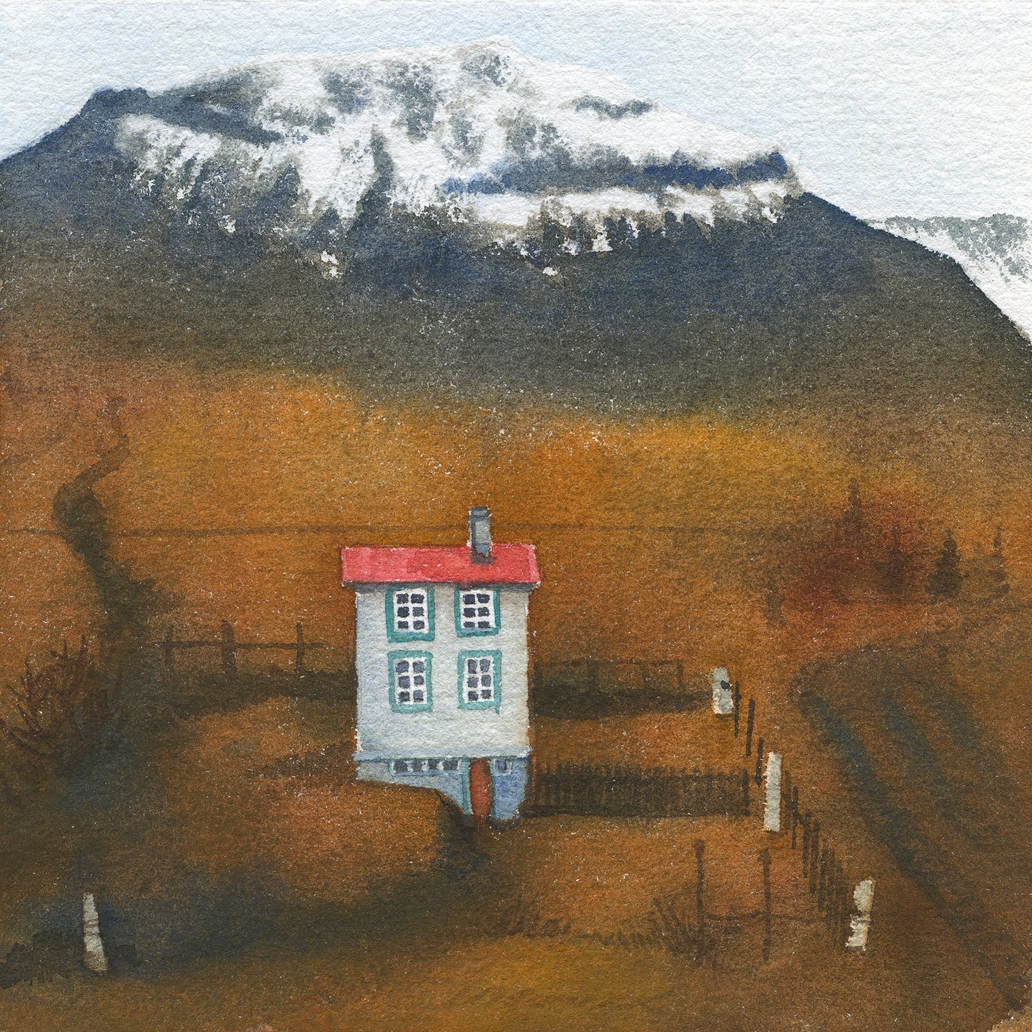 Small house with a red roof in a mountainous landscape