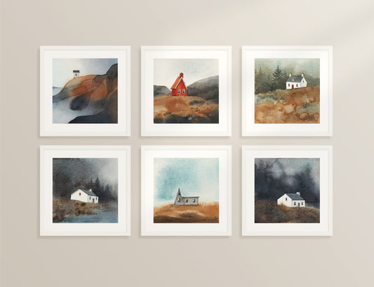 Set of six framed watercolor landscape paintings with houses on a beige wall.