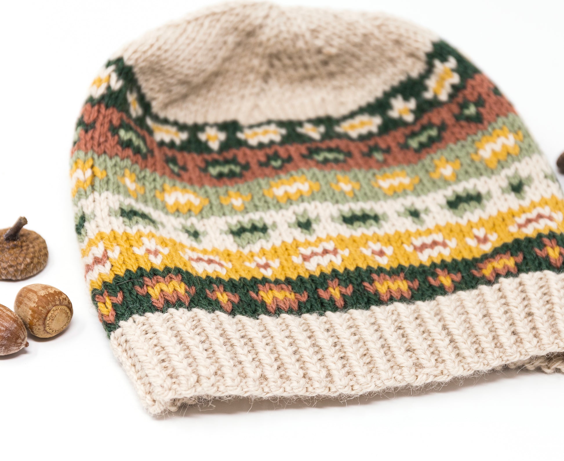 Close-up of a twisted ribbing of a hand-knitted hat with Fair Isle pattern