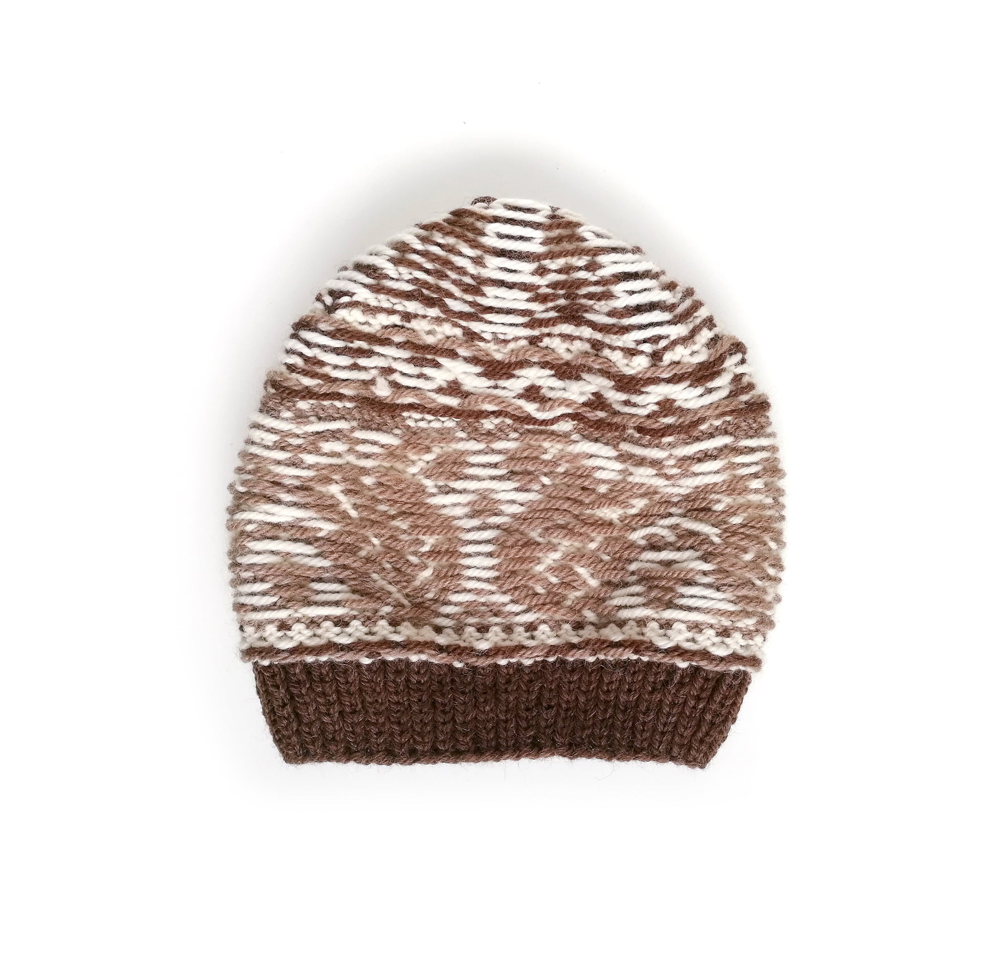 Brown and white hand-knitted Fair Isle hat inside out