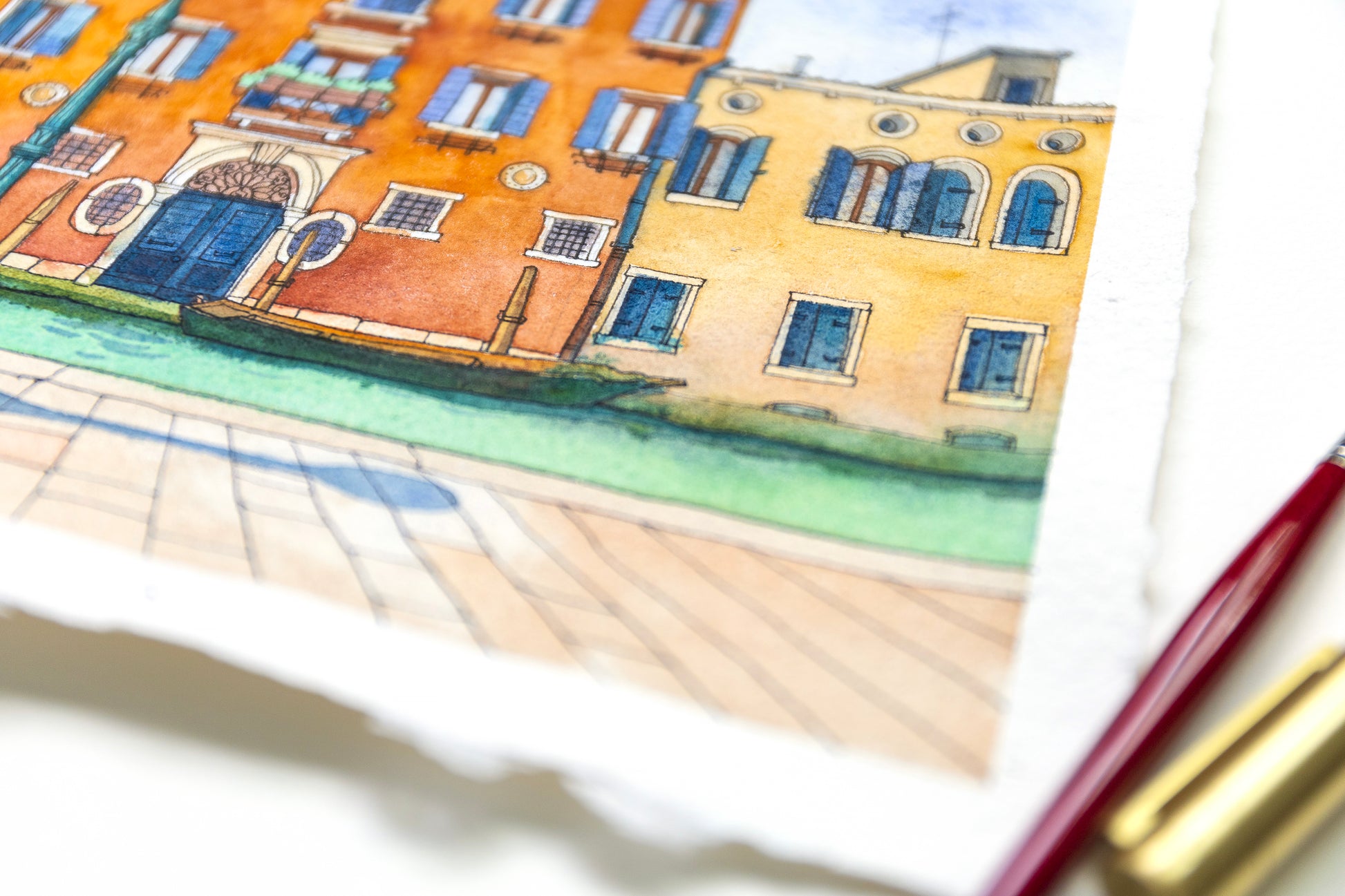 Colorful watercolor painting of a street scene with buildings and canals in Venice, Italy