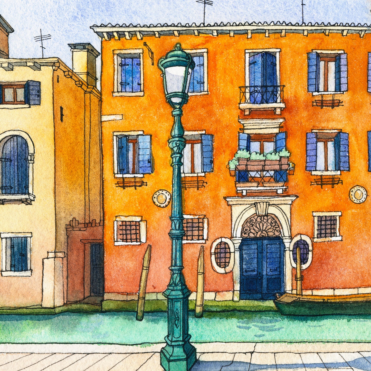 Colorful street scene with buildings, a lamp post, and a canal in Venice.