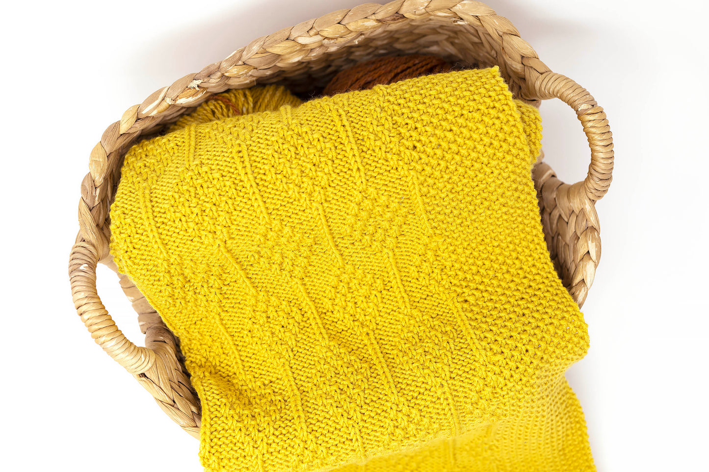 mustard yellow merino wool hand-knitted baby blanket in Diamonds pattern