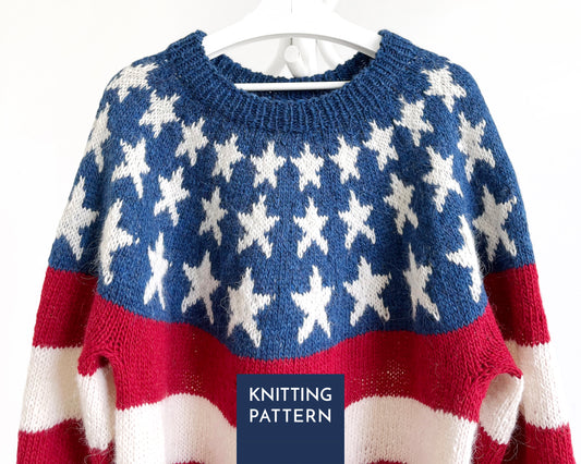 A knitted sweater with an American flag-inspired pattern, featuring a blue upper section with white stars, red and white horizontal stripes, and a dark blue label overlay reading 'KNITTING PATTERN'.