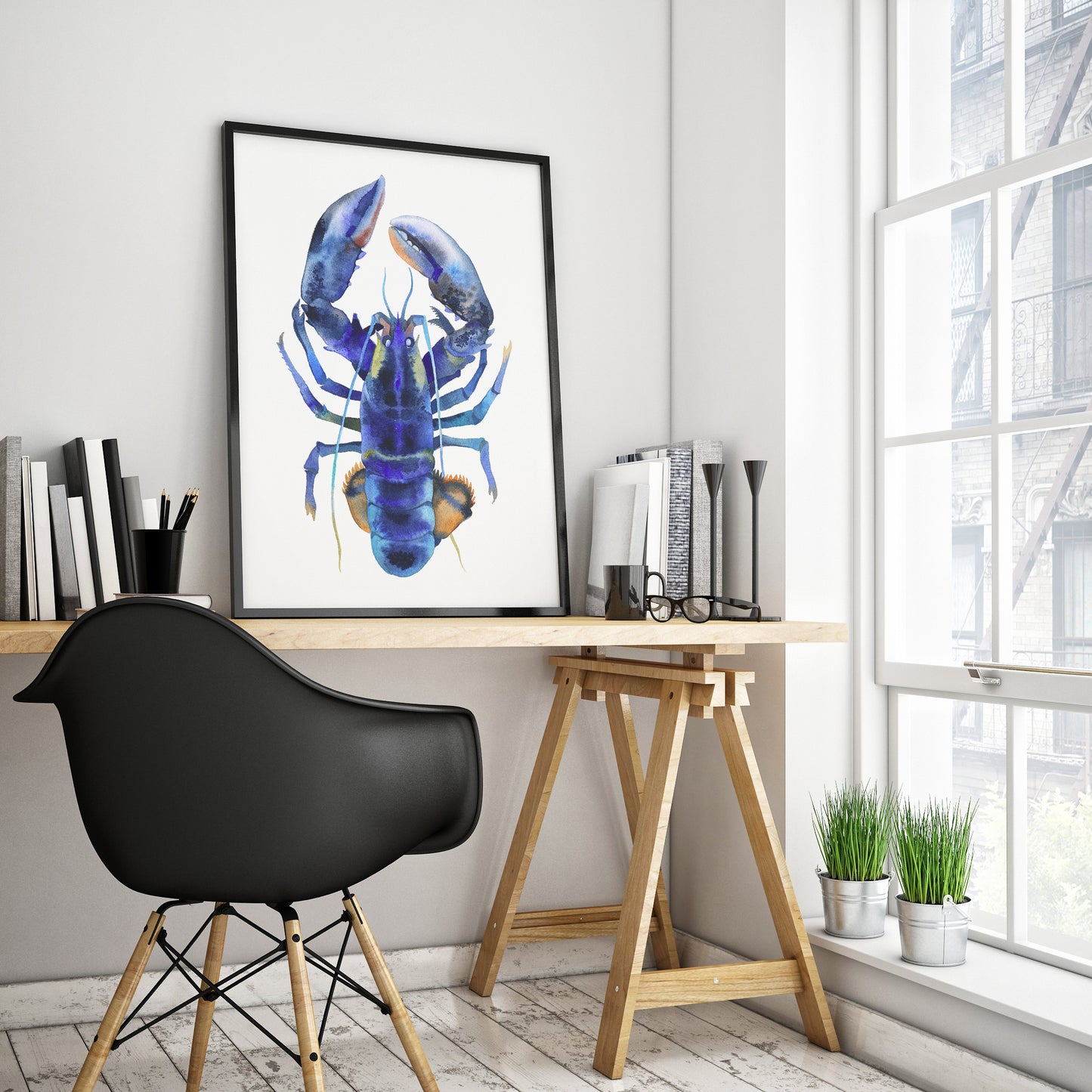 Blue lobster watercolor art print in a black frame