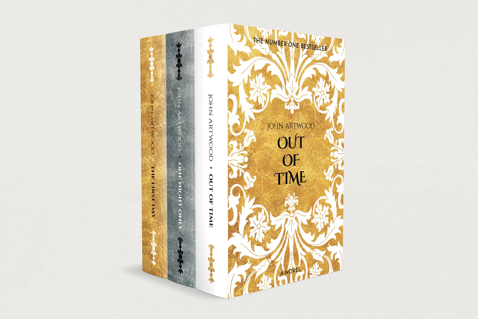 A boxed set of three premade book series cover templates with ornate gold and white damask-style covers, shown standing upright on a light gray background.