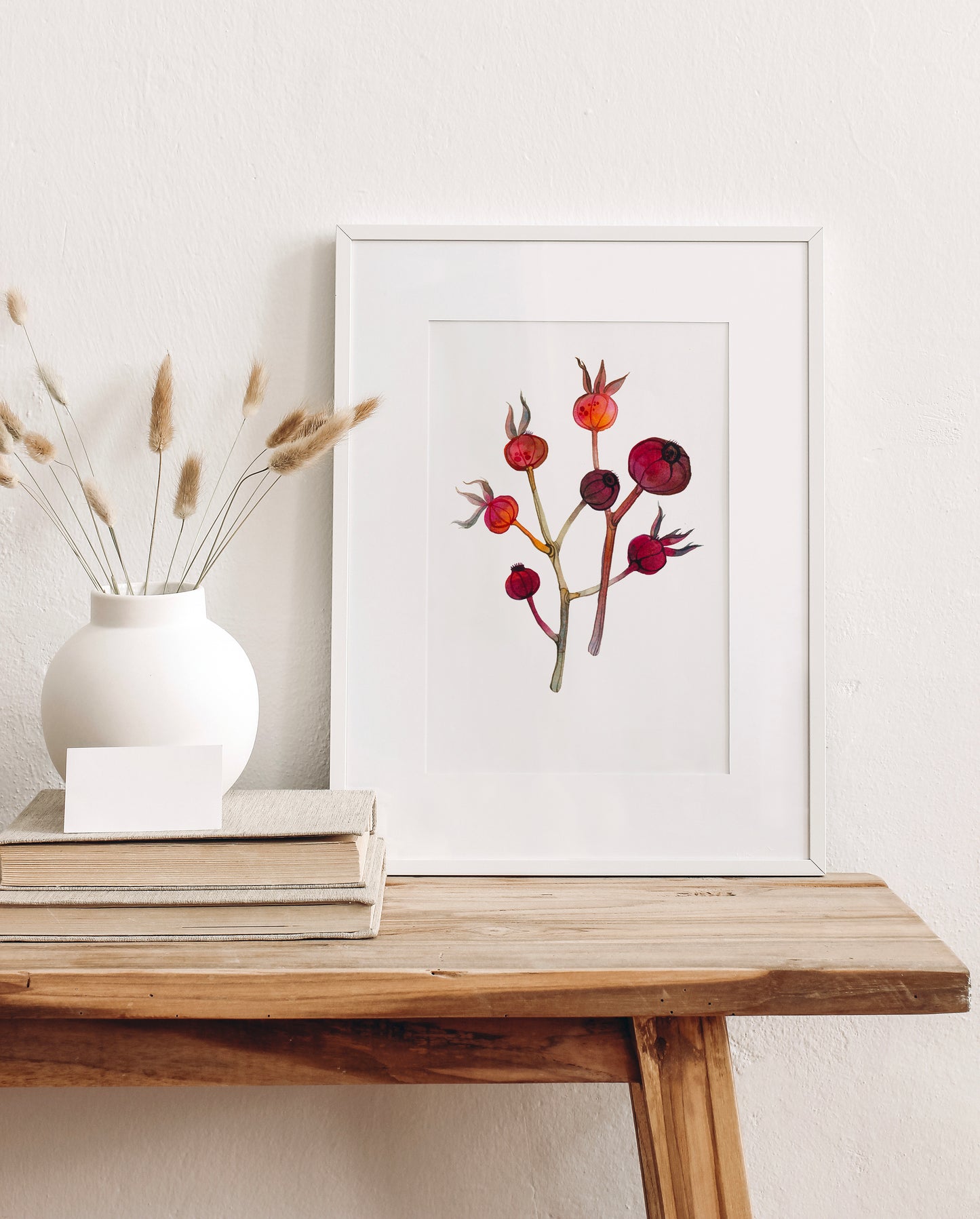 A white-framed dried dog rose hips watercolor print 