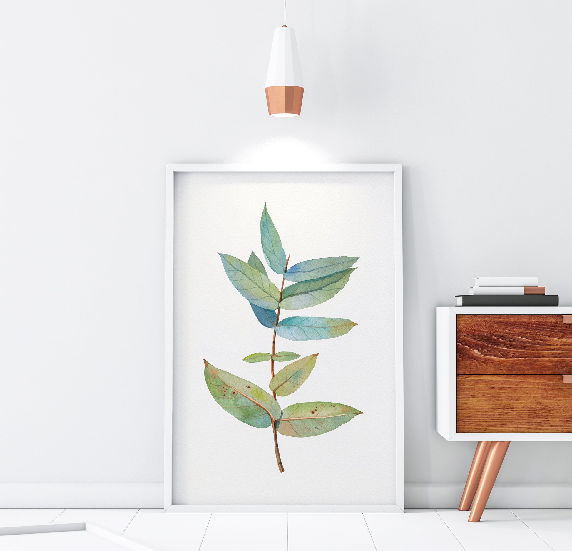 Large eucalyptus branch watercolor print in a white frame