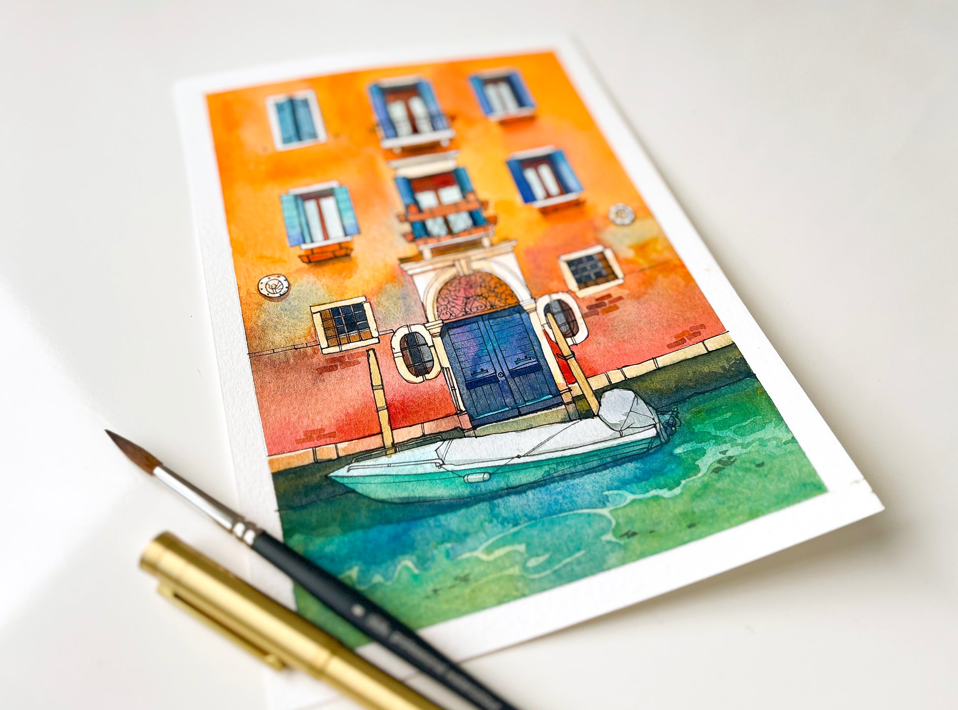 Original watercolor painting of a yellow house with a boat on Fondamenta de la Misericordia in Venice