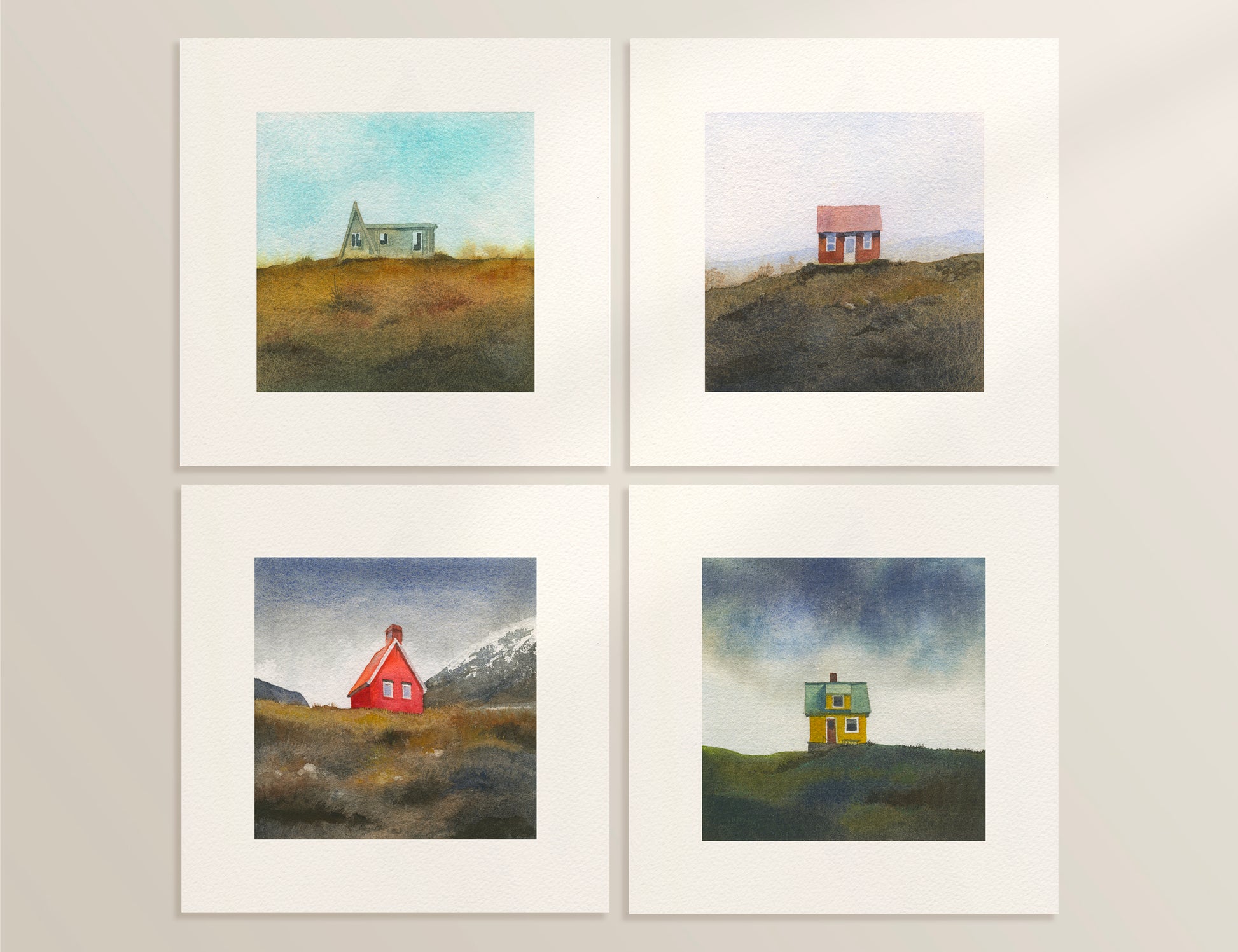 Four watercolor Icelandic landscapes — an A-frame cabin in the Westfjords, a red cottage in the Icelandic hills, a red cabin near Egilsstaðir in East Iceland, and a colourful house on Flatey Island.