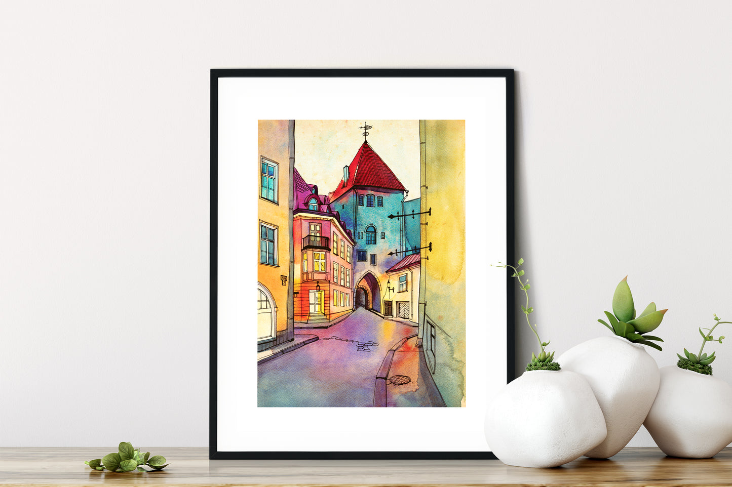 Small framed watercolor art print depicting Pikk street in Old Tallinn, Estonia.