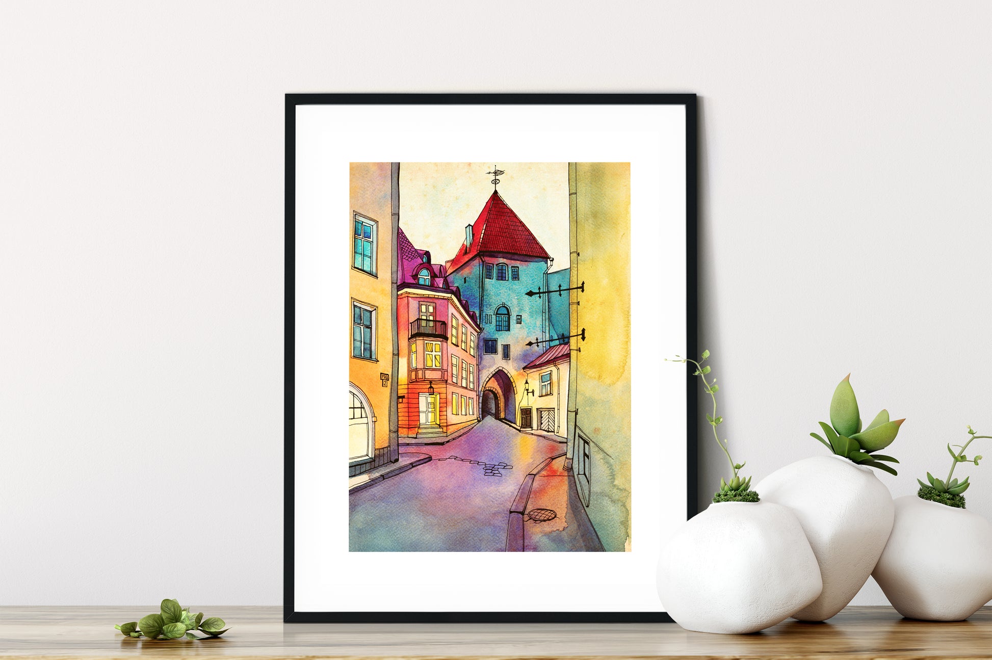 Small framed watercolor art print depicting Pikk street in Old Tallinn, Estonia.