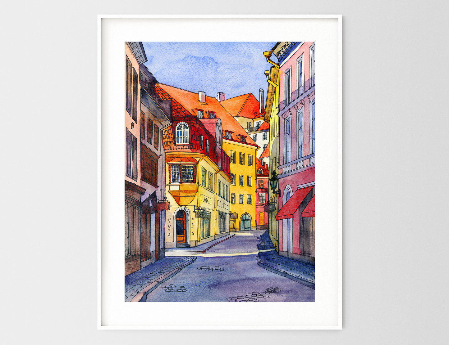 Framed watercolor and ink artwork of Pikk Street in Tallinn with colorful facades and the Veta shopfront