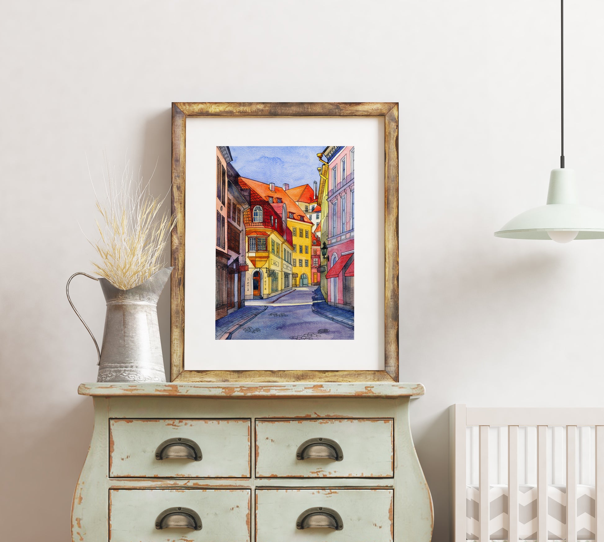 Artwork of Pikk Street in Tallinn with colorful facades and the Veta shopfront, displayed in a wooden frame