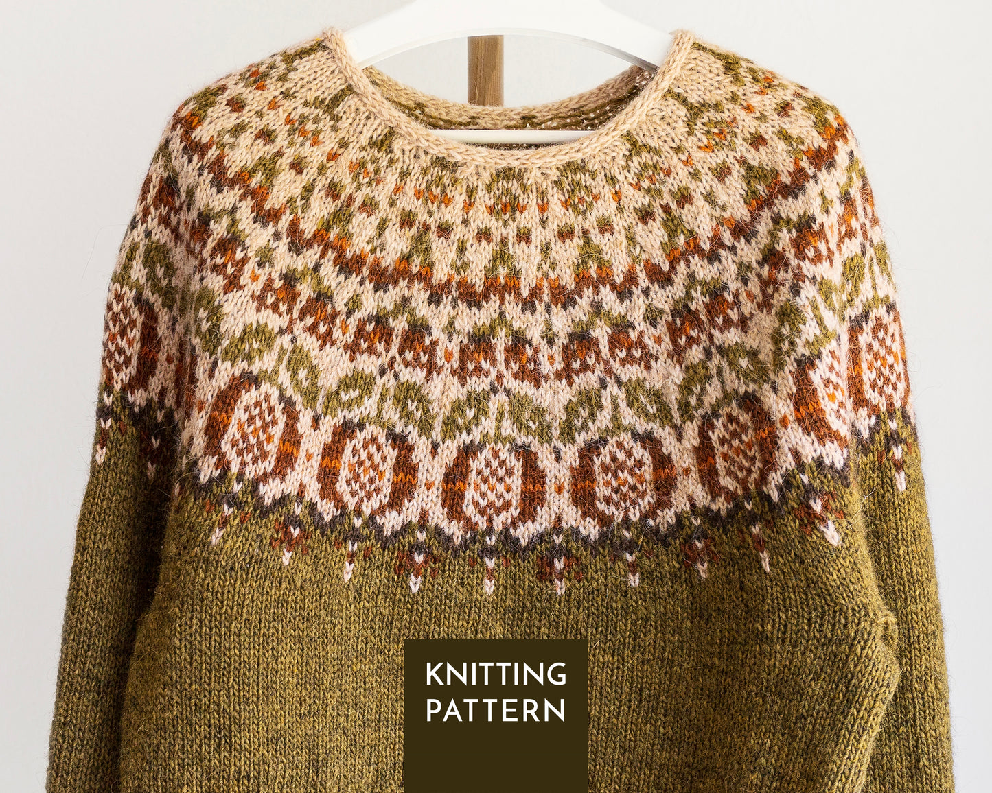 Close-up of pomegranate colorwork yoke on Icelandic lopapeysa sweater