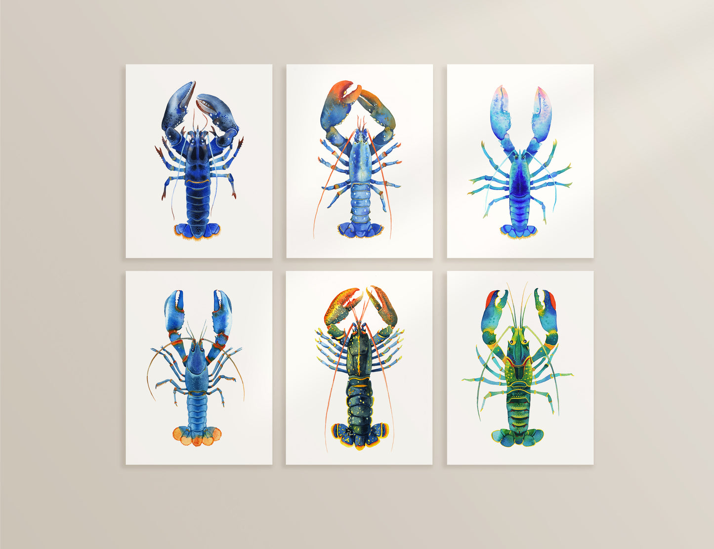 Set of six watercolor blue lobster art prints.