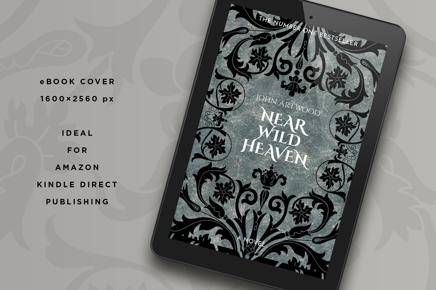 A tablet with a book cover featuring silver and black baroque ornament on a gray background.