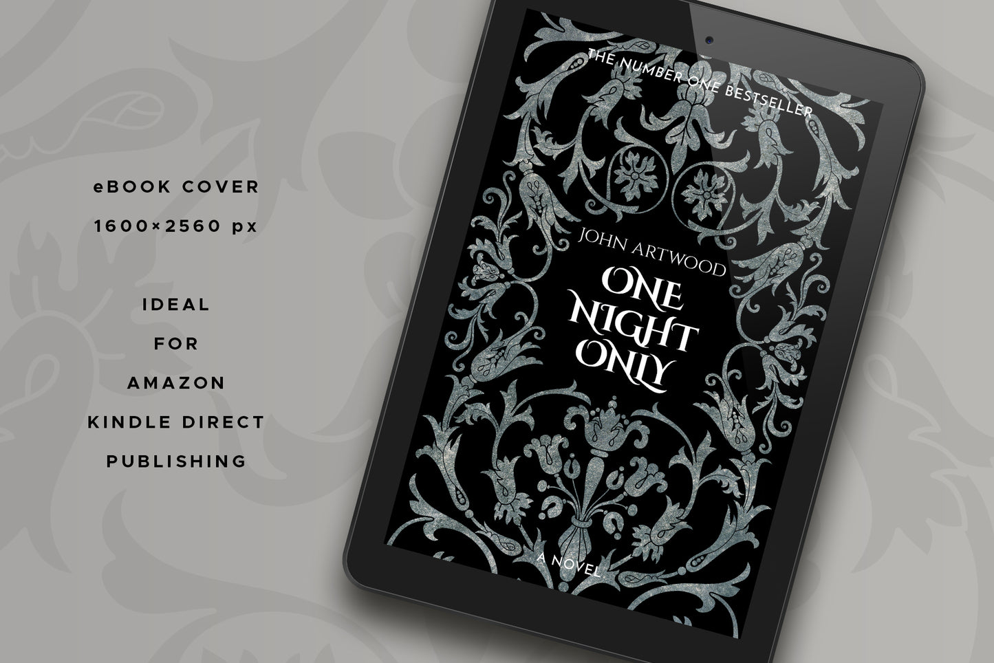A tablet with a book cover featuring silver baroque ornament on a black background, displayed on a gray surface.