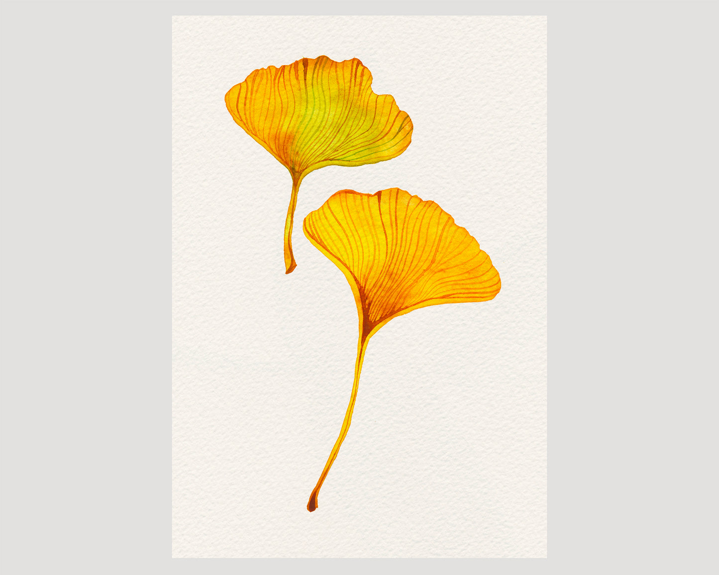 A minimalist art print featuring two watercolor ginkgo leaves in vibrant yellow and orange tones.